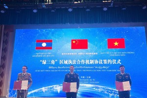 越中老三国代表签署绿三角区域执法合作机制协议。图：越通社