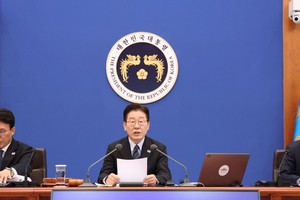 韩国总统李在明（中）。图：联合记者团