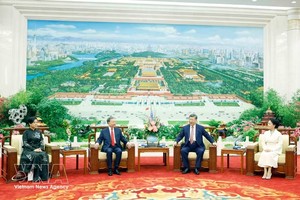 越南共产党中央总书记、国家主席苏林及夫人同中共中央总书记、国家主席习近平及夫人共进茶叙。图：越通社