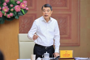 越南政府总理黎明兴在河内主持召开与工商部的工作会议。图：日北