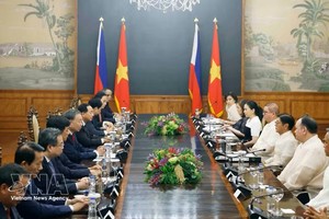 越南共产党中央总书记、国家主席苏林与菲律宾总统菲律宾总统费迪南德·罗慕尔德兹·马科斯举行会谈。图：越通社
