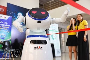 2026年人工智能日（AI Day）活动中的产品展示与介绍区域。图：越通社