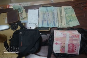 老街国际口岸边防哨所已发现并查获多起通过老街国际陆路口岸运输外币的案件。图：越通社