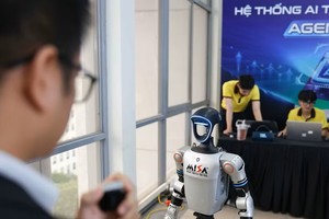 在2026年人工智能日活动（AI Day 2026）的产品展示与推介区域，越南正通过这一平台集中展现其在全球AI硬件供应链中日益提升的地位。图：越通社