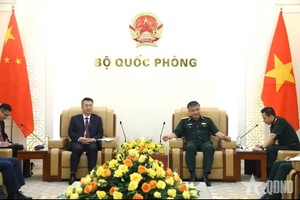 阮文贤上将会见中国公安部部长助理吕武钦。图：人民军报