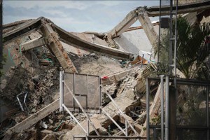 2026年8月12日，哥伦比亚卡利市一处建筑物在地震后倒塌。图：新华社/越通社