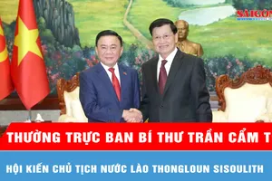 Thường trực Ban Bí thư Trần Cẩm Tú hội kiến Chủ tịch nước Lào Thongloun Sisoulith