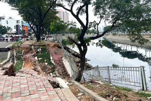 豆腐涌塌陷、人行道断裂的画面。