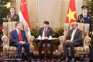 党中央总书记、国家主席苏林与新加坡总统尚达曼举行会谈。