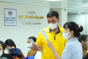  胡志明市玉明全科诊所按规定开展医保诊疗服务。