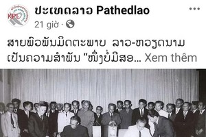 挝国家通讯社《巴特寮报》（Pathetlao）发表的社论。图自越通社发 