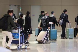 2026年3月5日，韩国首尔西部仁川国际机场的乘客。图：韩联社/越通社发 