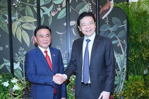 党中央政治局委员、党中央书记处常务书记陈锦秀会见新加坡人民行动党秘书长、政府总理黄循财。
