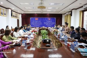 奠边省代表团与老挝波乔省的工作会谈现场。