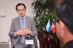 越南常驻联合国代表团团长杜雄越大使接受越通社驻纽约记者采访。图自越通社