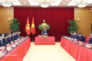 党中央政治局委员、党中央书记处常务书记陈锦秀会见老挝人民革命党高级干部代表团。