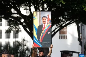 Tuần hành ủng hộ Tổng thống Nicolas Maduro tại Caracas. Ảnh: XINHUA