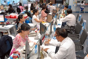 Consumer credit accounts for 10 percent of outstanding loans in HCMC. A large amount of these has run into personal house buyers(Photo: SGGP)