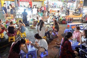Many vendor households have been relocated in Pham Van Hai street, Tan Binh district after HCMC authorities implemented a tough campaign to reclaim encroached pavements for pedestrians (Photo: SGGP)