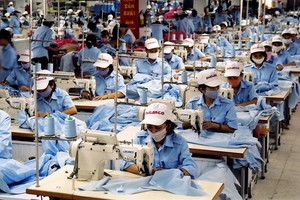 Garment products for export at Duc Giang Corp, an affiliate of Vietnam Textile and Garment Group.  (Photo: VNA/VNS)