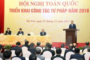 President Tran Dai Quang speaks at a meeting held by the Ministry of Justice yesterday to review its performance over the past year and set tasks for 2018. (Photo: VNA/VNS)