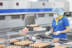 A chicken egg processing plant of Ha Huan Company, loaned by Vietcombank