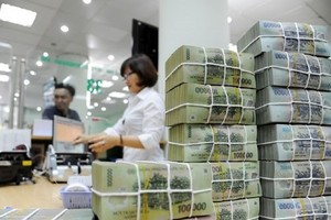 Bad debts worth VND 93.7 trillion (US$4.12 billion) were recovered last year. (Photo: cafef.vn)