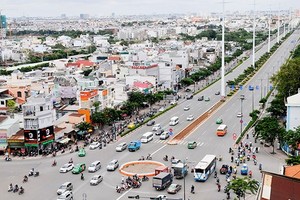 Pham Van Dong street connects Tan Son Nhat International Airport with HCMC’s eastern entrance gateway (Photo: SGGP)