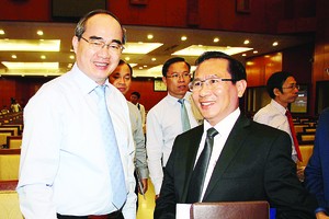 HCMC Party Chief Nguyen Thien Nhan (L) at the conference (Photo: SGGP)