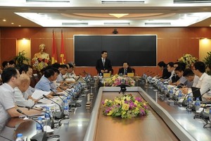 Leaders of CMSC and MIC at the meeting.  Photo baochinhphu.vn