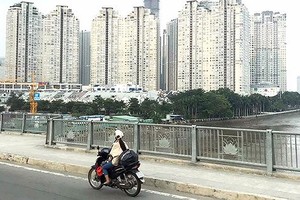 Banks will tighten real estate loan (Photo: SGGP)