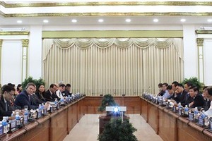 HCMC People’s Committee and agency leaders work with American businesses delegation in smart traffic field (Photo: thanhuytphcm)