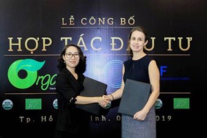 The representatives of Organica (left) and SEAF at the signing ceremony. (Photo: Organica)