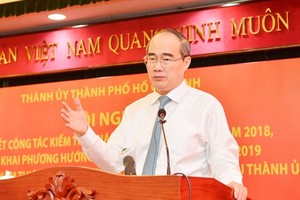 Secretary of HCMC Party Committee Nguyen Thien Nhan delivers a statement at the conference on January 16 (Photo: SGGP)