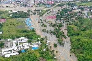 This aerial photo shows the area affected by flash floods in Sentani, Papua province, Indonesia, on March 18, 2019. Flash floods and mudslides triggered by downpours tore through mountainside villages in Indonesia’s easternmost province, killing dozens of