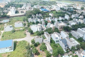 Tan Nhut commune Residential area and Mall. (Photo: SGGP)