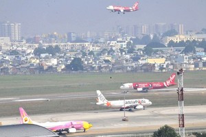 Planes from multiple airlines operating at Tan Son Nhat International Airport