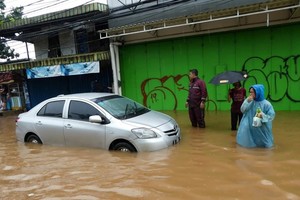 Flooding in Jakarta after heavy rain (Photo: AFP)