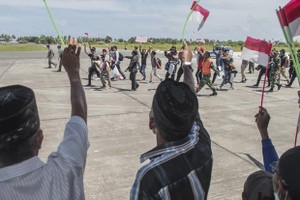 Indonesian citizens return home after 14-day quarantine on Natuna island. (Photo: Antaranews)