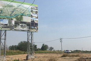 Billboard for an apartment complex to be built on land with incomplete infrastructure