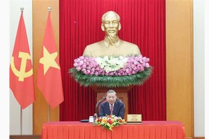 Party General Secretary To Lam and Vietnamese officials in the phone talks with US President Donald Trump on the evening of July 2 (Hanoi time) (Photo: VNA)