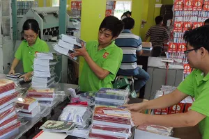 Sản xuất tập tại Công ty Vĩnh Tiến. Ảnh: THÀNH TRÍ