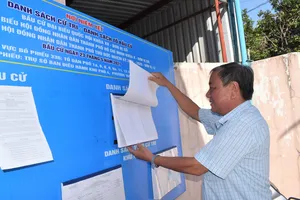 Điểm niêm yết danh sách cử tri tại trụ sở  Ban điều hành khu phố 4, phường  Tam Bình, TP Thủ Đức, TPHCM. Ảnh:  ĐÌNH LÝ