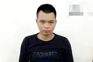 Nghi phạm Hà Phúc Đạt bị bắt giữ sau khi dùng súng bắn một tài xế taxi để cướp xe