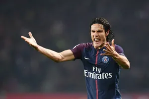 Niềm vui của Edinson Cavani sau khi ghi bàn thắng thứ 2.500 cho Paris SG ở Ligue 1. Ảnh: Getty Images