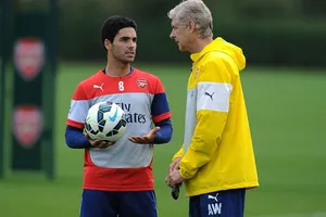 Cựu HLV Arsene Wenger kỳ vọng cựu đội trưởng Mikel Arteta giúp đội khôi phục phong cách vốn có. Ảnh: Getty Images