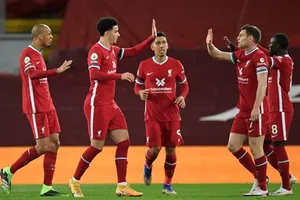 Liverpool quá mạnh để qua đó có đồng điểm với Tottenham ở ngôi đầu Premier League. Ảnh: Getty Images 