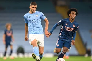 Ruben Dias thực sự đã trở thành thủ lĩnh nơi hàng thủ Man.City. Ảnh: Getty Images