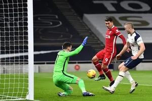 Roberto Firmino cùng Liverpool giành kết quả tốt tại Tottenham và London. Ảnh: Getty Images 
