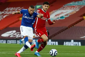 Richarlison mở đường giúp Everton kết thúc 24 trận không biết thắng ở Anfield. Ảnh: Getty Images